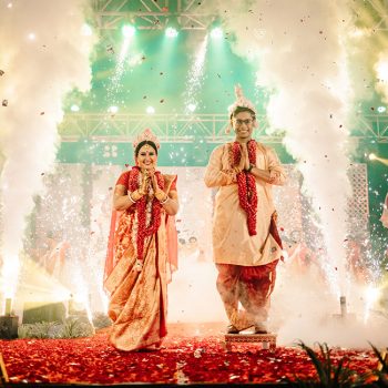 This couple’s wedding mandap with its red and white color palette was a heartfelt ode to their Bengali heritage