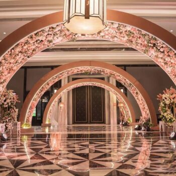 Wrapped in roses and bathed in a soft champagne glow, this wedding reception unfolded like an elegant floral reverie