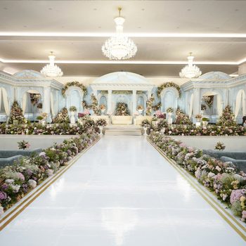 Featuring a powder blue palatial facade and brimming with blooms – this couple’s walima decor was larger-than-life