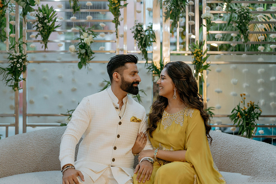 A heady combination of green, ivory and orange - this couple’s close-knit roka ceremony exuded a charming homely vibe