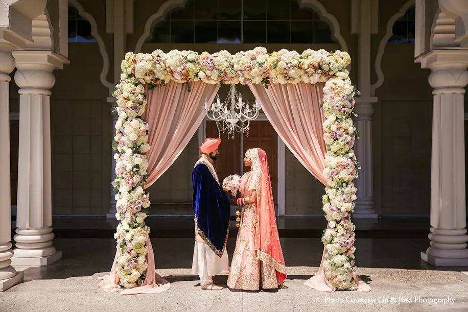 Couple in peach outfit for the sikh wedding