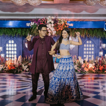 Adorned with bold electric blue hues and glamorous chandeliers, this bride’s mehndi celebration was a unique one!